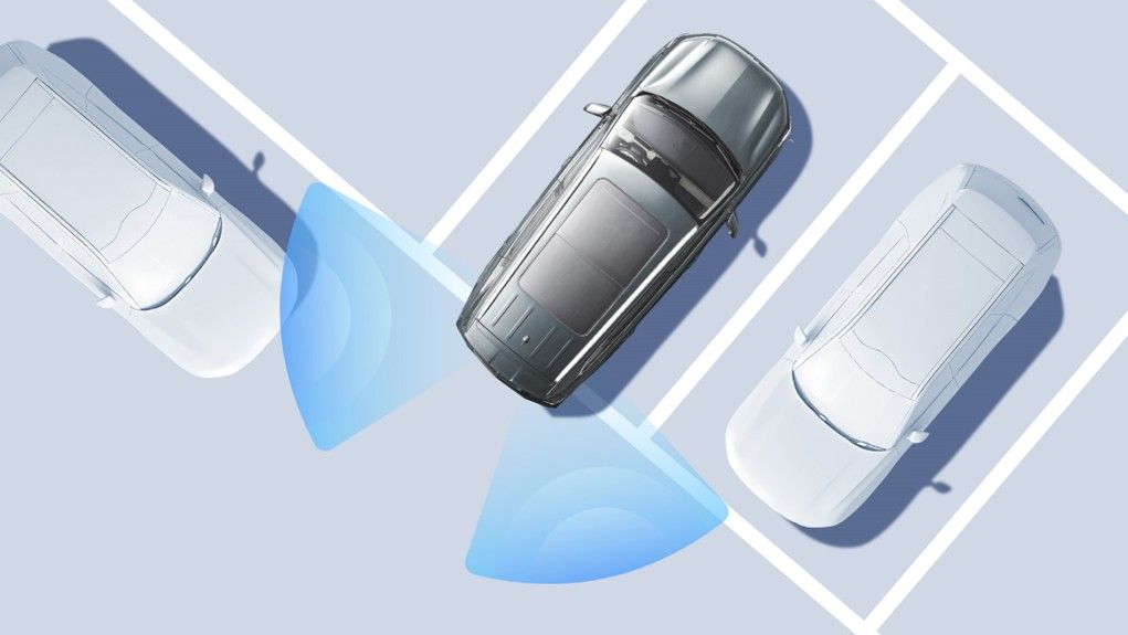 Scans rear/side zones when reversing. Warns with sound/dashboard visuals if vehicles cross path, prevents low-speed collisions. image